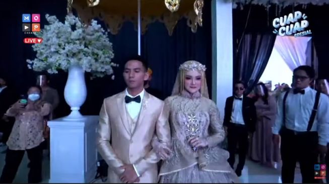 Momen pernikahan Ridho DA dan Syifa. [YouTube/MOP Channel]