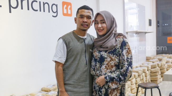 Putra Siregar dan Septia Siregar. [Kabarindong.com/Alfian Winanto]